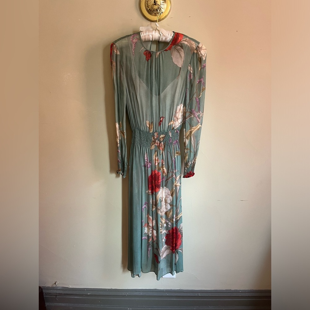 Silk floral dress from Zara. Never worn. Comes with cream colored slip. Size SM